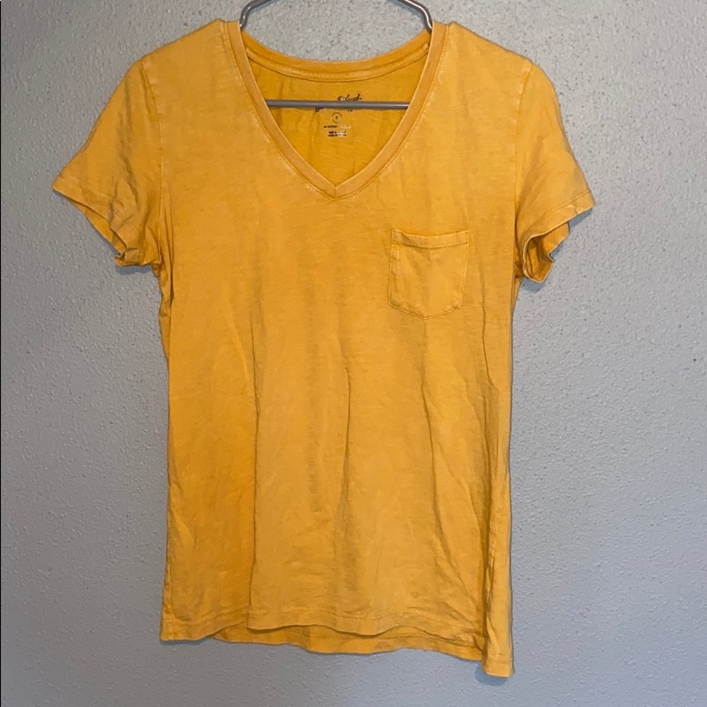 Yellow v-neck shirt